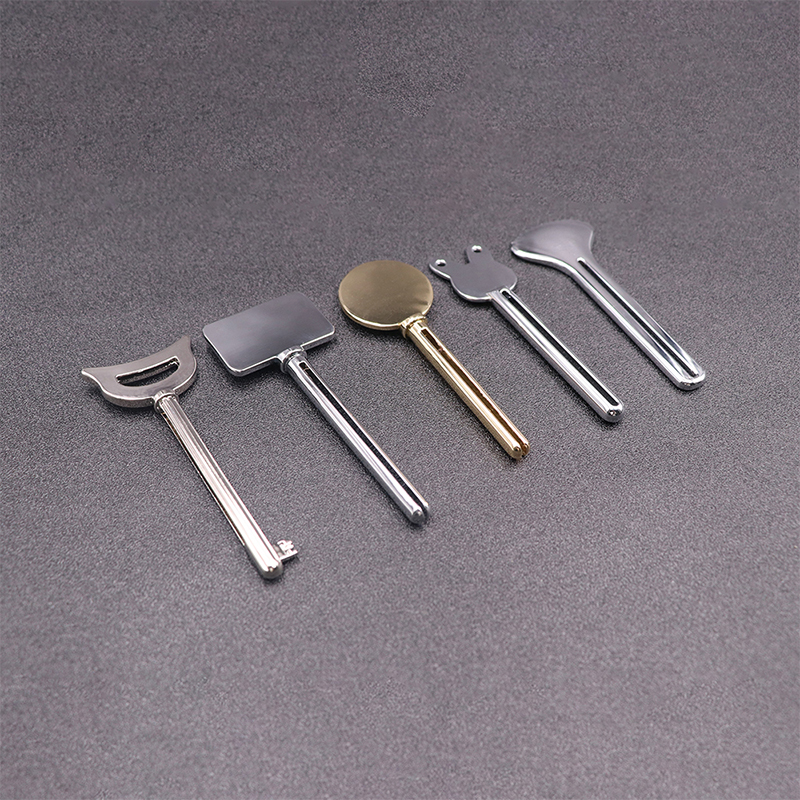 โลหะเครื่องจ่ายยาสีฟันครีมล้างหน้ายาสีฟันหลอดคั้นรูปร่างที่สำคัญเครื่องสำอางหลอดคั้น โลหะเครื่องจ่ายยาสีฟันครีมล้างหน้ายาสีฟันหลอดคั้นรูปร่างที่สำคัญเครื่องสำอางหลอดคั้น