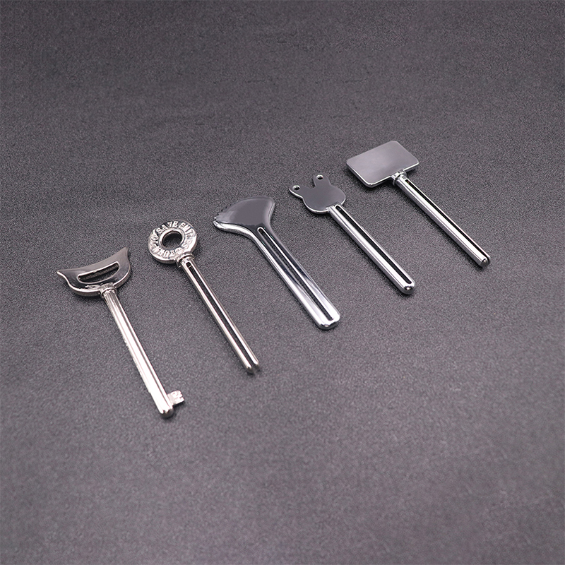 โลหะเครื่องจ่ายยาสีฟันครีมล้างหน้ายาสีฟันหลอดคั้นรูปร่างที่สำคัญเครื่องสำอางหลอดคั้น โลหะเครื่องจ่ายยาสีฟันครีมล้างหน้ายาสีฟันหลอดคั้นรูปร่างที่สำคัญเครื่องสำอางหลอดคั้น