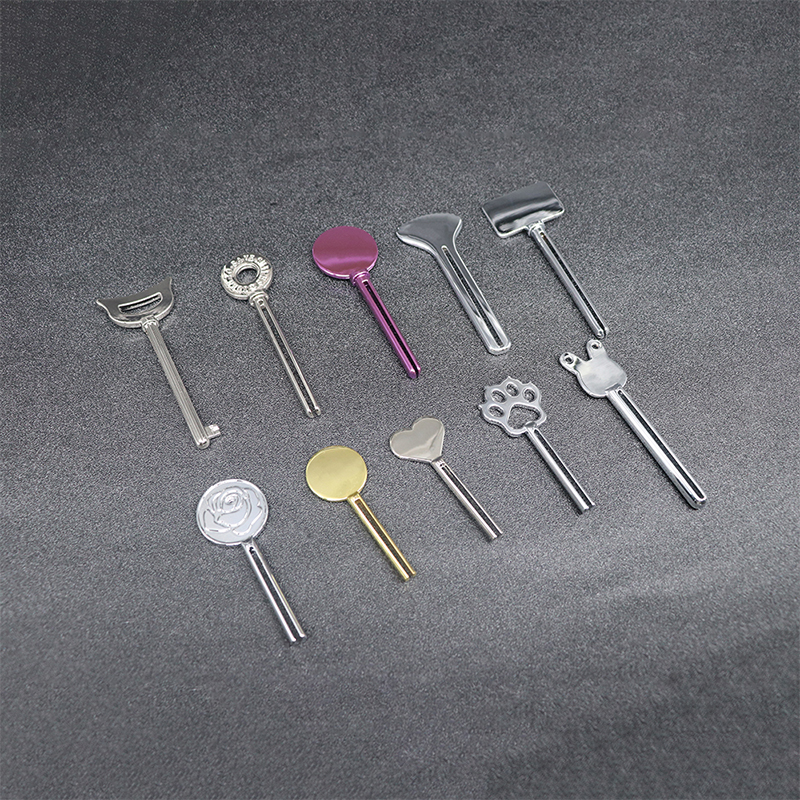 โลหะเครื่องจ่ายยาสีฟันครีมล้างหน้ายาสีฟันหลอดคั้นรูปร่างที่สำคัญเครื่องสำอางหลอดคั้น โลหะเครื่องจ่ายยาสีฟันครีมล้างหน้ายาสีฟันหลอดคั้นรูปร่างที่สำคัญเครื่องสำอางหลอดคั้น