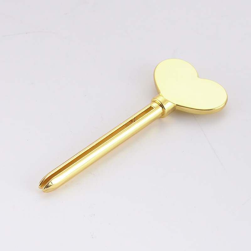 โลหะเครื่องจ่ายยาสีฟันครีมล้างหน้ายาสีฟันหลอดคั้นรูปร่างที่สำคัญเครื่องสำอางหลอดคั้น โลหะเครื่องจ่ายยาสีฟันครีมล้างหน้ายาสีฟันหลอดคั้นรูปร่างที่สำคัญเครื่องสำอางหลอดคั้น