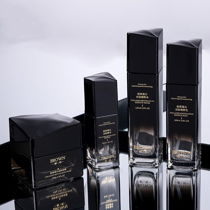 ขวดครีมแก้วทรงสี่เหลี่ยมที่ไม่ซ้ำใครพร้อมการออกแบบฝายกสำหรับบรรจุภัณฑ์เครื่องสำอาง ขวดครีมแก้วทรงสี่เหลี่ยมที่ไม่ซ้ำใครพร้อมการออกแบบฝายกสำหรับบรรจุภัณฑ์เครื่องสำอาง